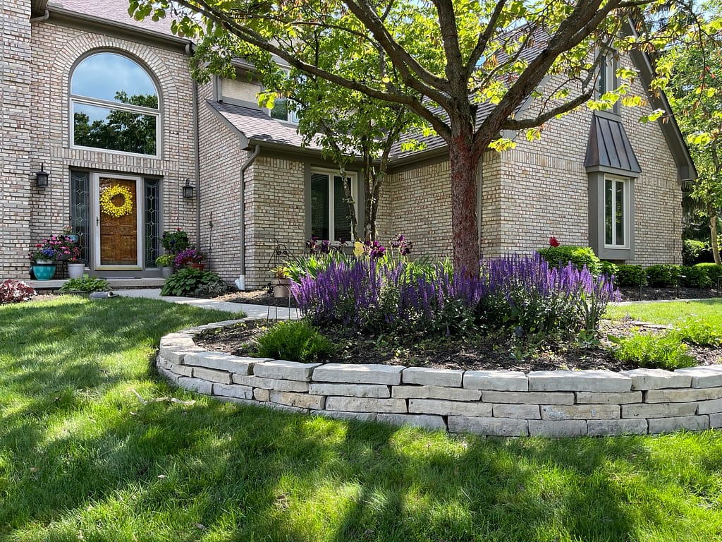 Power wash landscaping rocks, house, driveway, and sidewalks